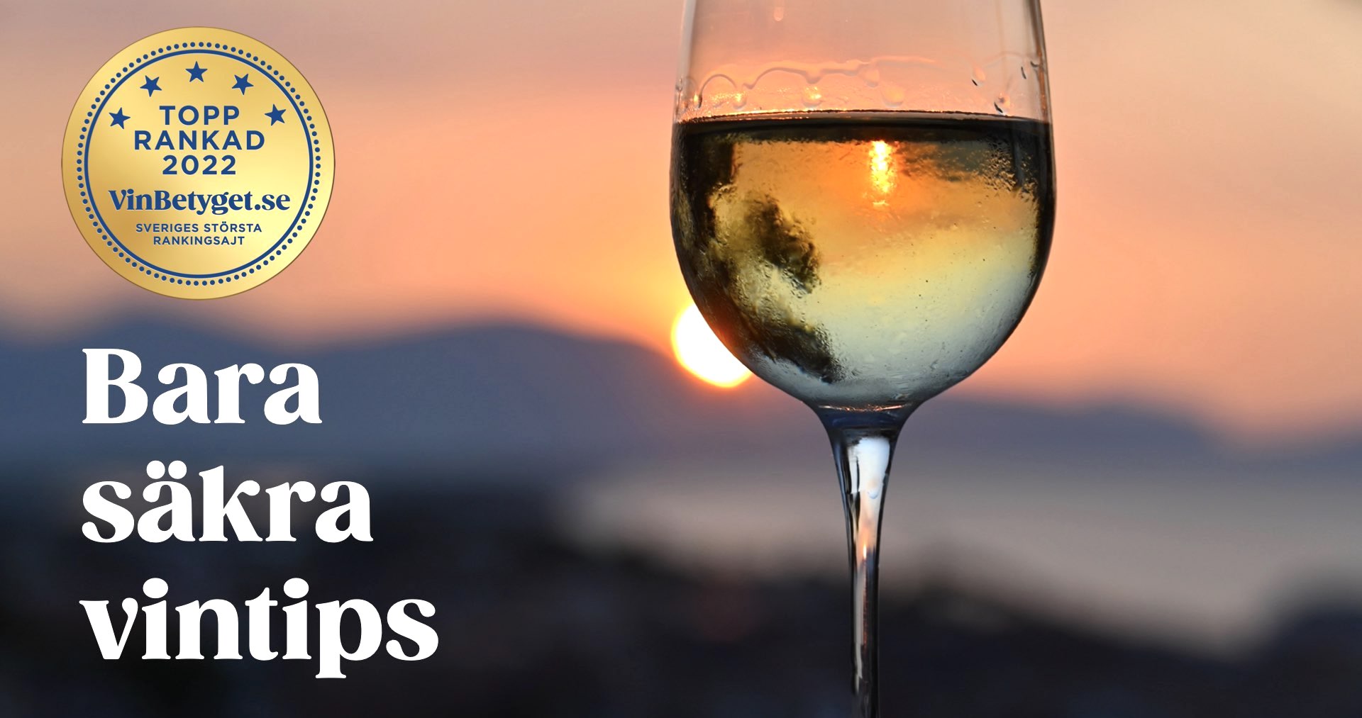 Ett glas vitt vin i solnedgången. Text: Bara säkra vintips